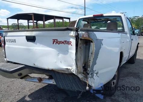 1999 Nissan Frontier Xe z USA, uszkodzony, nr VIN 1N6DD21S8XC318584